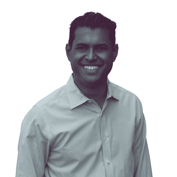 Black and white headshot of Vin Gopal, New Jersey LD-11 (Senate), smiling and looking directly into the camera.