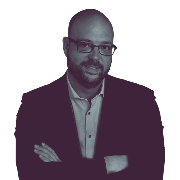 A black and white image of Bryan Cohn of North Carolina Senate District Thirty-Two showing him from the waist smiling and looking into the camera.