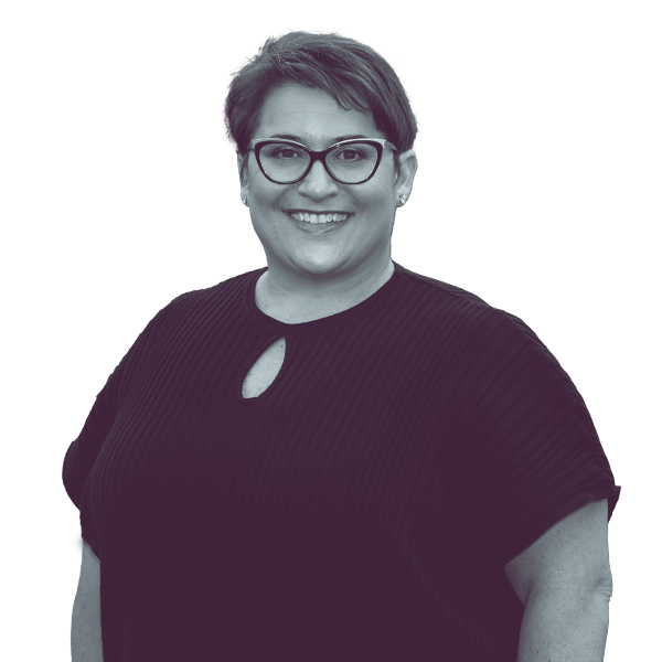 A black and white image of Evonne Hopkins of North Carolina House District Thirty-Five showing her from the waist smiling and looking into the camera.