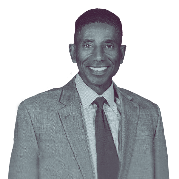 Black and white image of James Mercer of North Carolina Senate District Eleven showing him from the waist smiling and looking into the camera.