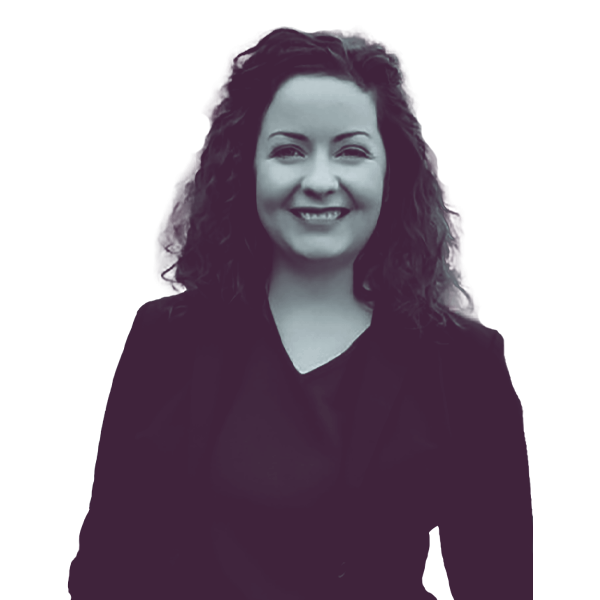 A black and white image of Lindsey Prather of North Carolina House District 115 showing her from the waist smiling and looking into the camera.