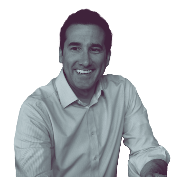 Black and white image of Terence Everitt of North Carolina Senate District Eighteen showing him from the waist smiling and looking into the camera.