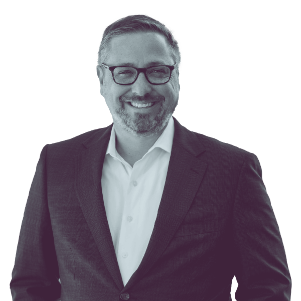 A black and white portrait of Jim Wertz of PA SD-49 from the waist up, smiling and looking into the camera.