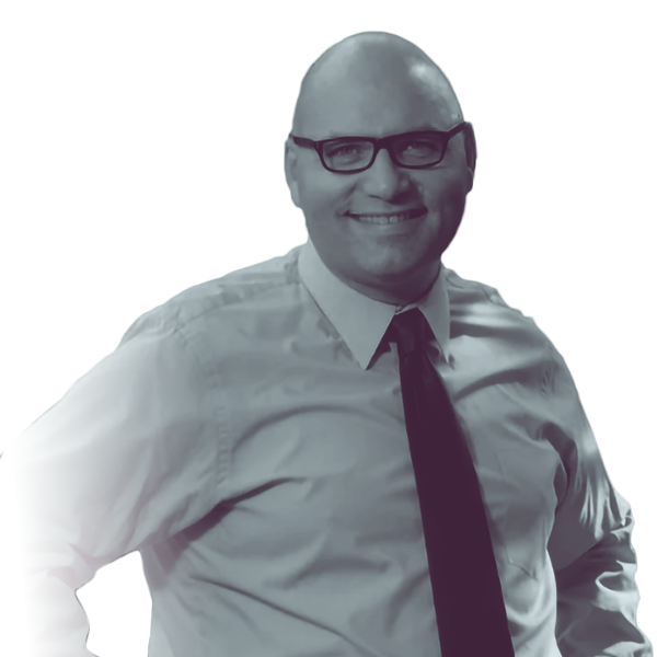 A black and white portrait of Rob Matzie of PA HD-16 from the waist up, smiling and looking into the camera.