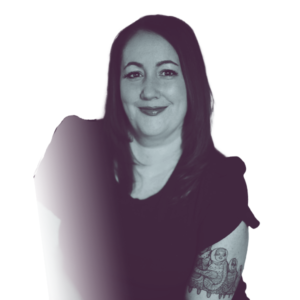 A black and white portrait of Sara Agerton of PA HD-88 from the waist up, smiling and looking into the camera.