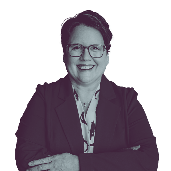 A black and white portrait of Mary Ann Folchert of Nebraska legislative district 31 from the waist up, smiling and looking into the camera.