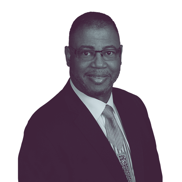 A black and white portrait of Victor Rountree of Nebraska legislative district 3 from the waist up, smiling and looking into the camera.