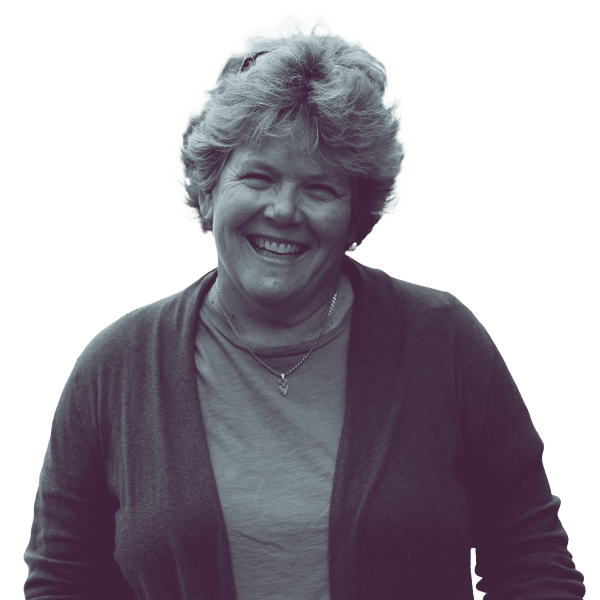 A black and white image of Ann Johnson Stewart of Minnesota Senate district forty-five from the waist up, smiling and looking into the camera.