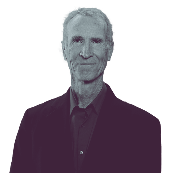 A black and white image of John McLean of Arizona Senate district seventeen from the waist up, smiling and looking into the camera.