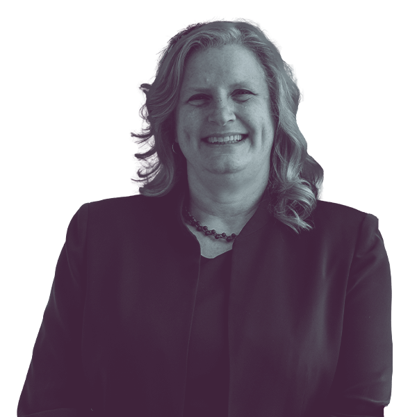 A black and white image of Jenn Hill of Michigan House district one hundred and nine from the waist up, smiling and looking into the camera.