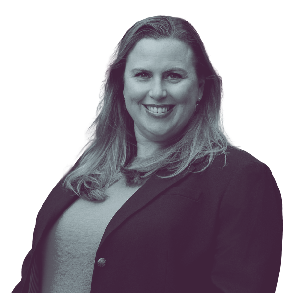A black and white waist-up portrait of Alicia Rule, candidate for Washington House District forty two, smiling and looking into the camera.