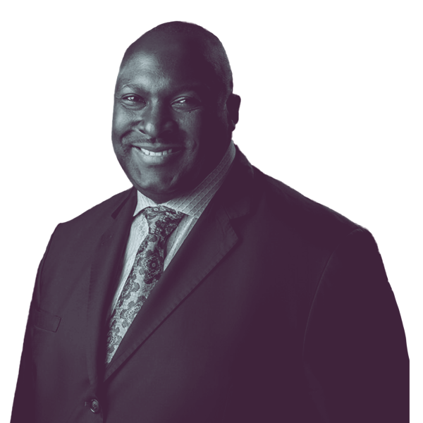 A black and white waist-up portrait of Daryl Parks, candidate for Florida Senate District three, smiling and looking into the camera.
