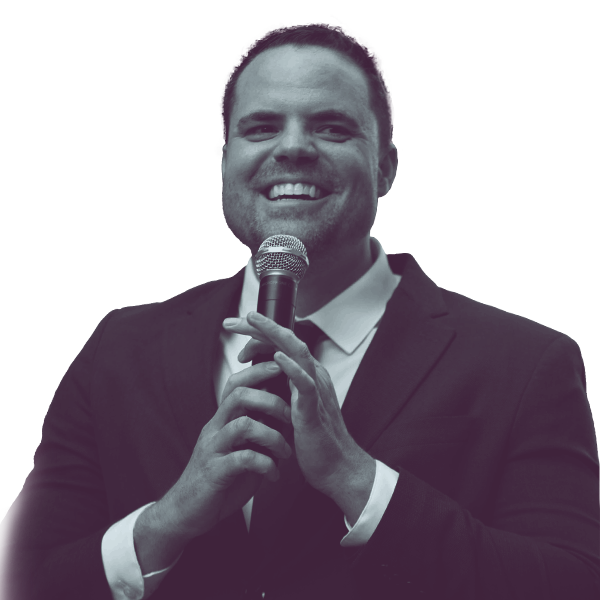 A black and white waist-up portrait of Joe Saunders, candidate for Florida House District one hundred and six, smiling and looking into the camera.