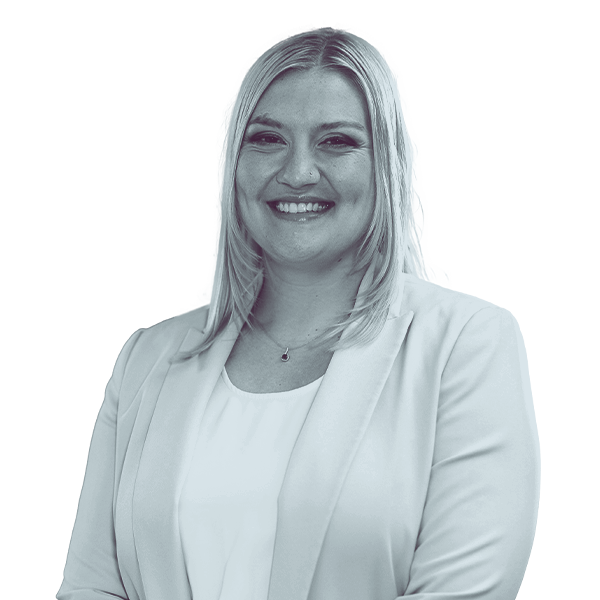 A black and white waist-up portrait of Sarah Henry, candidate for Florida House District thirty eight, smiling and looking into the camera.