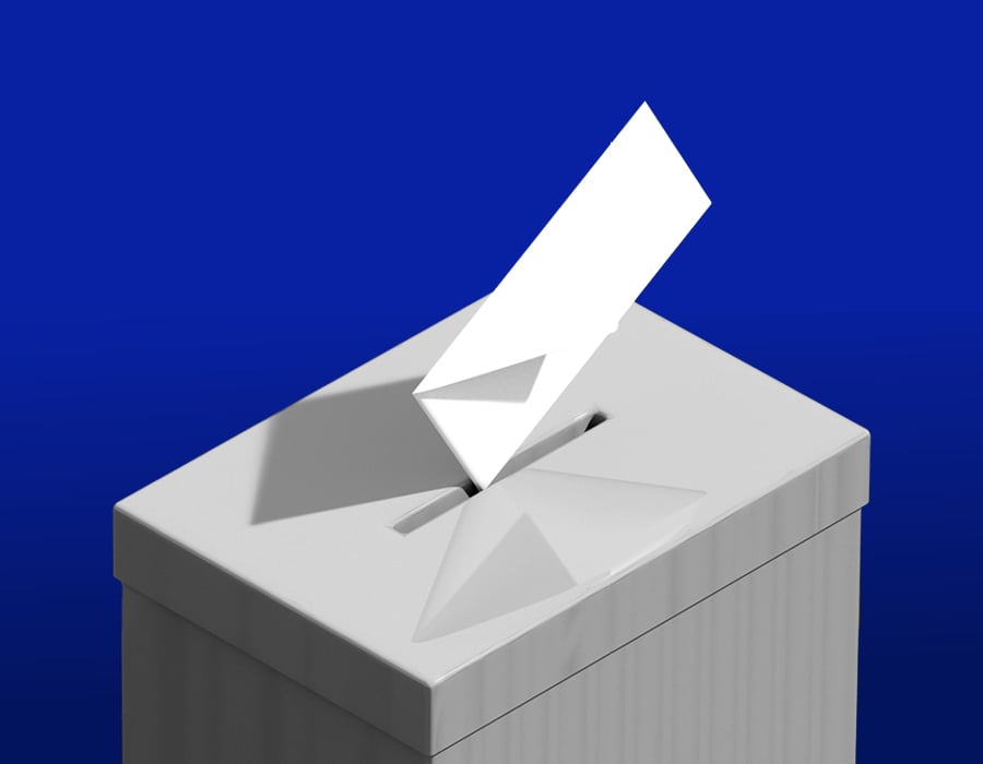 a close up image of an envelope falling into a ballot box in front of a blue background.