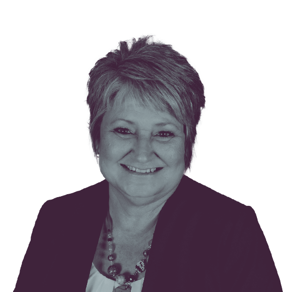 a black and white portrait of Iowa HD-100 Democratic Candidate, Nannette Griffin smiling and looking into the camera.