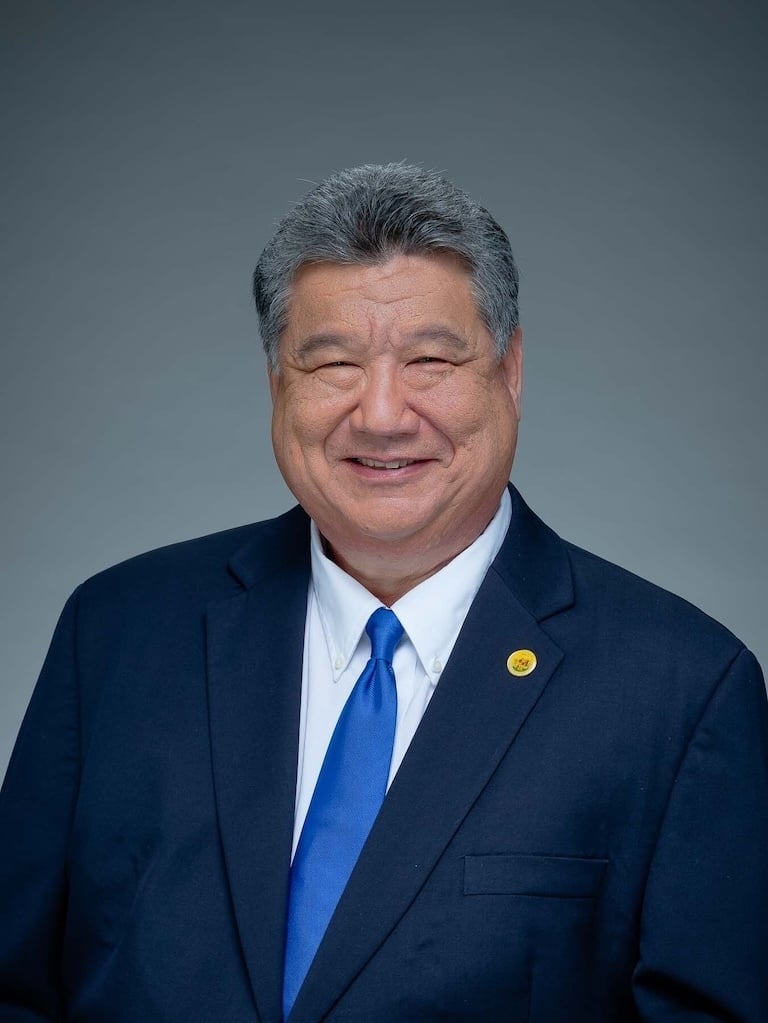 A professional portrait of DLCC Board Treasurer and Hawai’i Senate President Ron Kouchi.