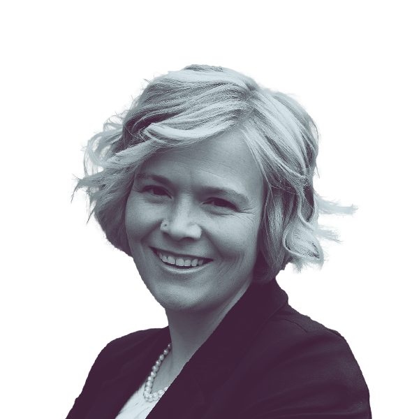 A black and white portrait of Kacey Carnegie, Democratic candidate for Virginia House District 89, smiling and looking into the camera.