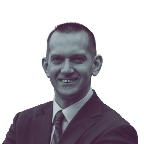 A black and white portrait of Anthony Angelozzi, candidate for New Jersey Assembly District 8, smiling and looking into the camera.