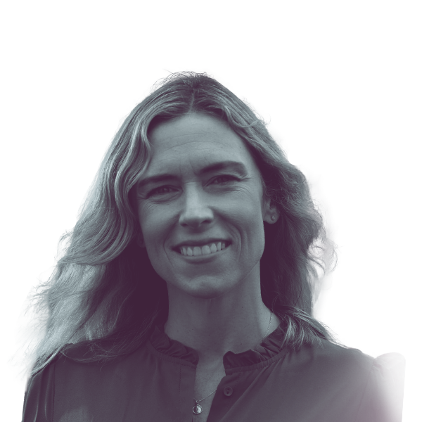 A black and white portrait of Margie Donlon, candidate for New Jersey Assembly District 11, smiling and looking into the camera.