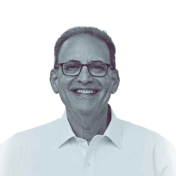 A black and white portrait of Roy Freiman, candidate for New Jersey Assembly District 16, smiling and looking into the camera.