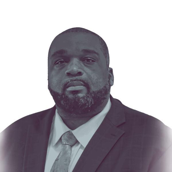 A black and white portrait of Justin Crosby, Democratic candidate for Mississippi House District 22, looking into the camera.