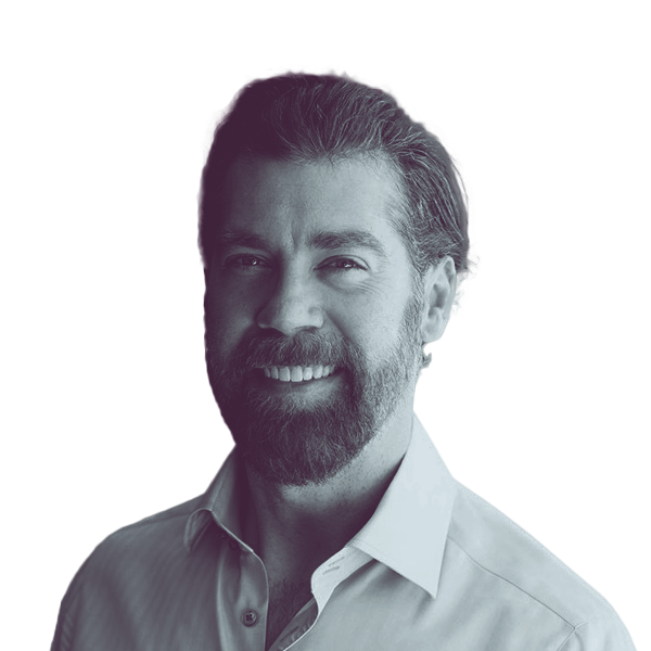 a black and white portrait of Rob Long, Democratic candidate for Florida House district 90, smiling and looking into the camera.