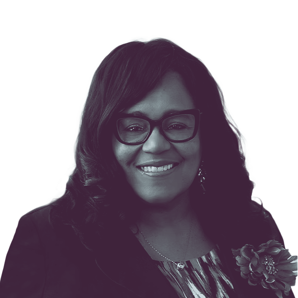 a black and white portrait of Renee Hardman, democratic candidate for Iowa Senate district 16, smiling and looking into the camera.