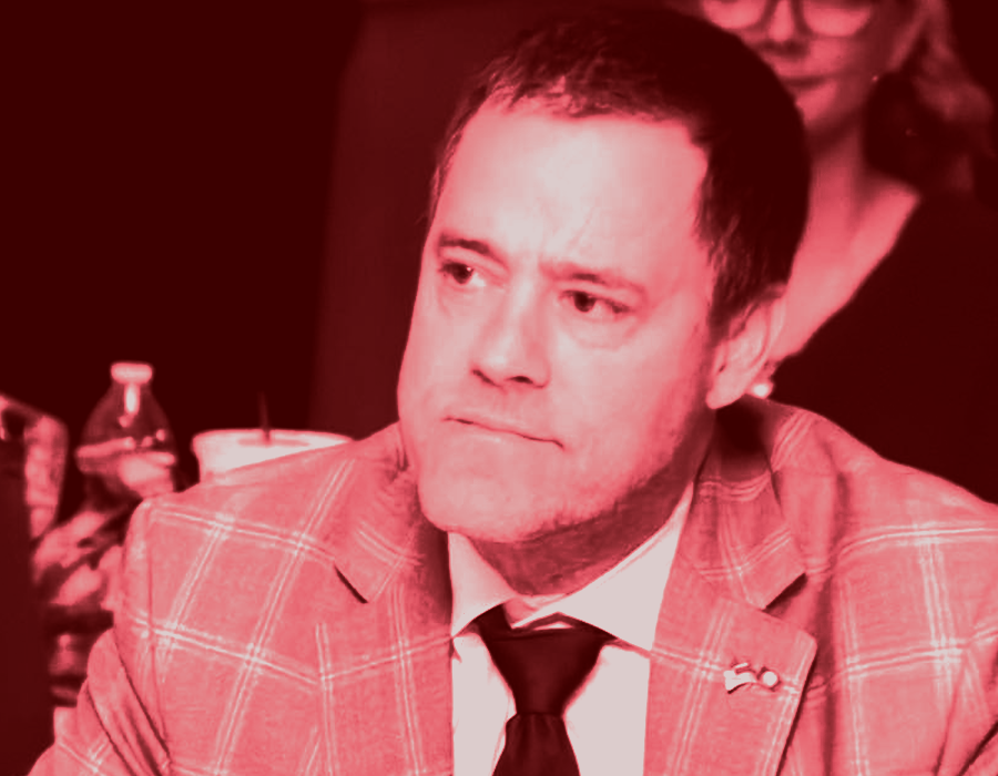 a red-scale portrait of defeated GOP candidate, Tim Anderson.